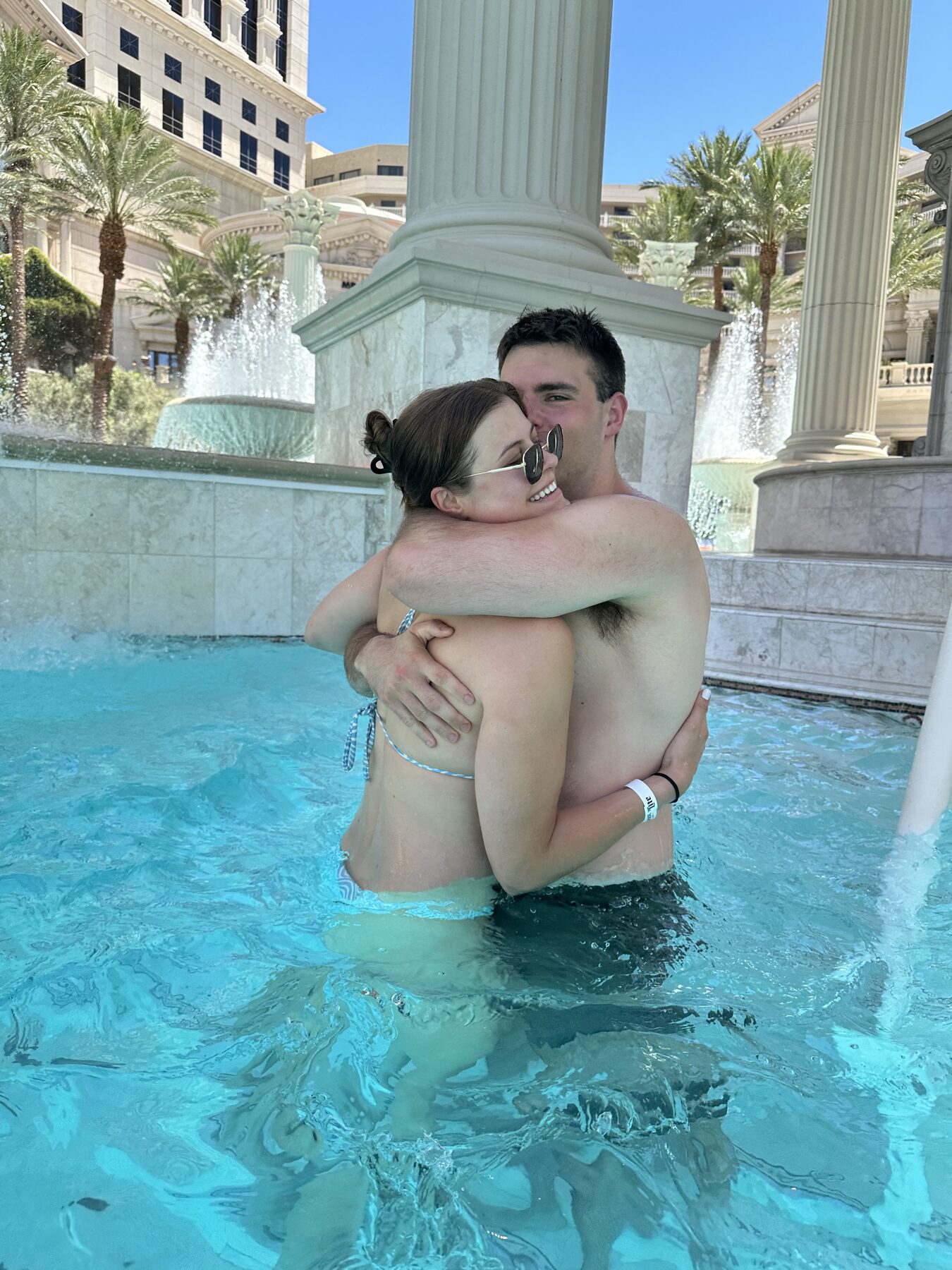 Tom and Anna in a Vegas pool on their first vacation
