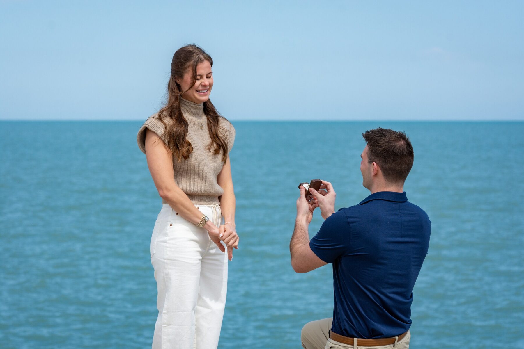 Tom proposing to Anna outside Theatre on the Lake